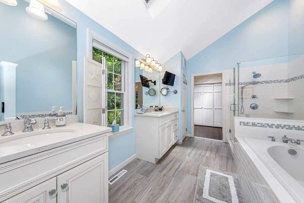 2 King George Drive Boxford, MA 01921 - Photo 31 of 41 a bathroom with a tub sink and mirror