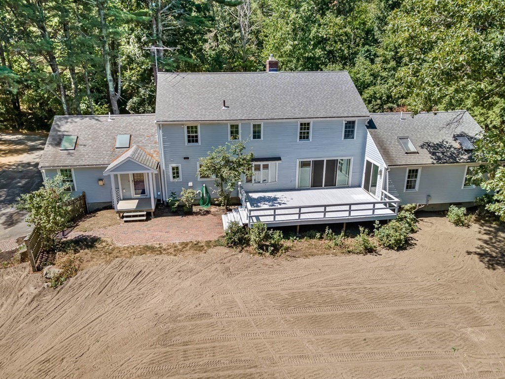2 King George Drive Boxford, MA 01921 - Photo 4 of 41 an aerial view of a house with a yard and a large tree