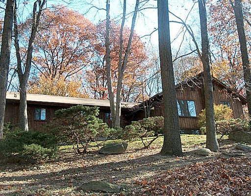 2181 Long Ridge Road Stamford, CT 06903 - Photo 1 of 1 a view of a house with a yard