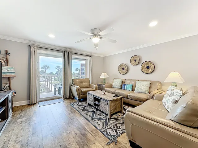 a living room with furniture and a table