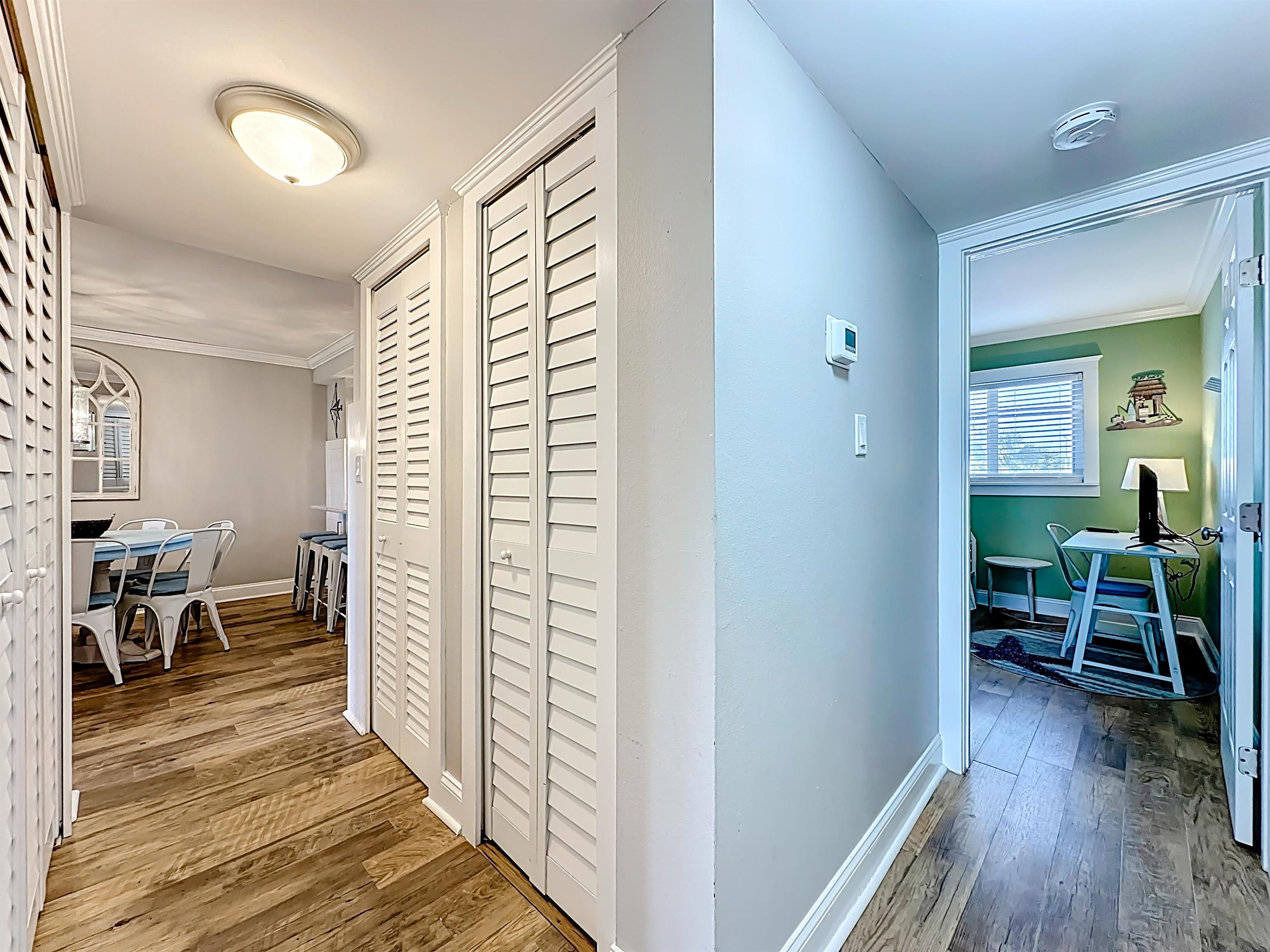 4 Ocean Trace Road, Unit 213 St. Augustine, FL 32080 - Photo 17 of 38 a view of a room with wooden floor and furniture