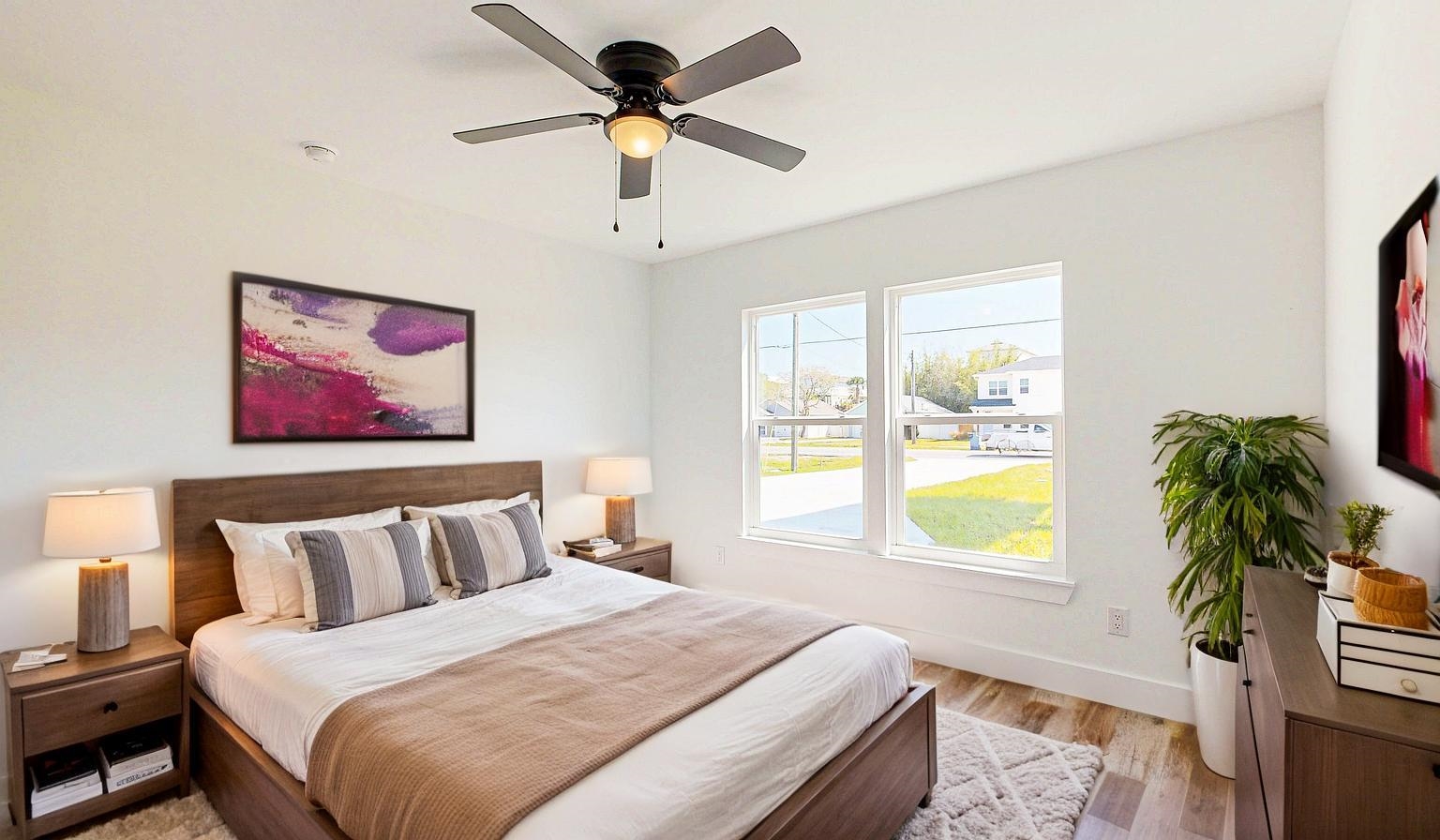 7975 A1A South St. Augustine, FL 32080 - Photo 14 of 33 a bedroom with a large bed and a window