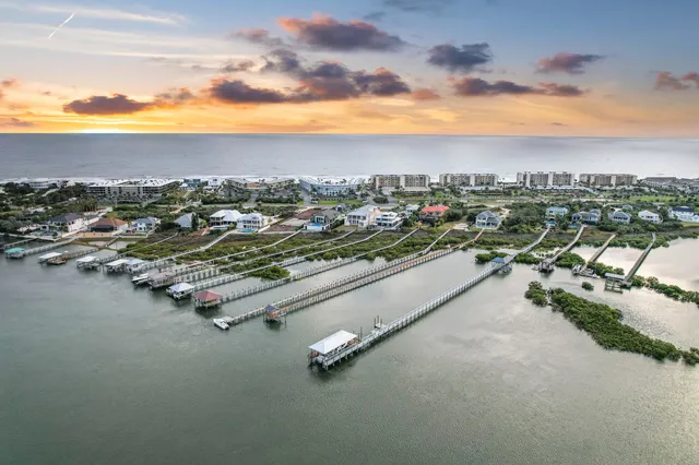 a view of swimming pool with outdoor seating and yard in back