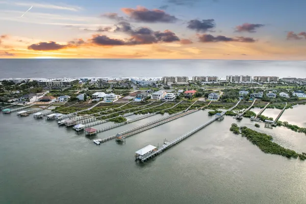 a view of a lake with sitting area