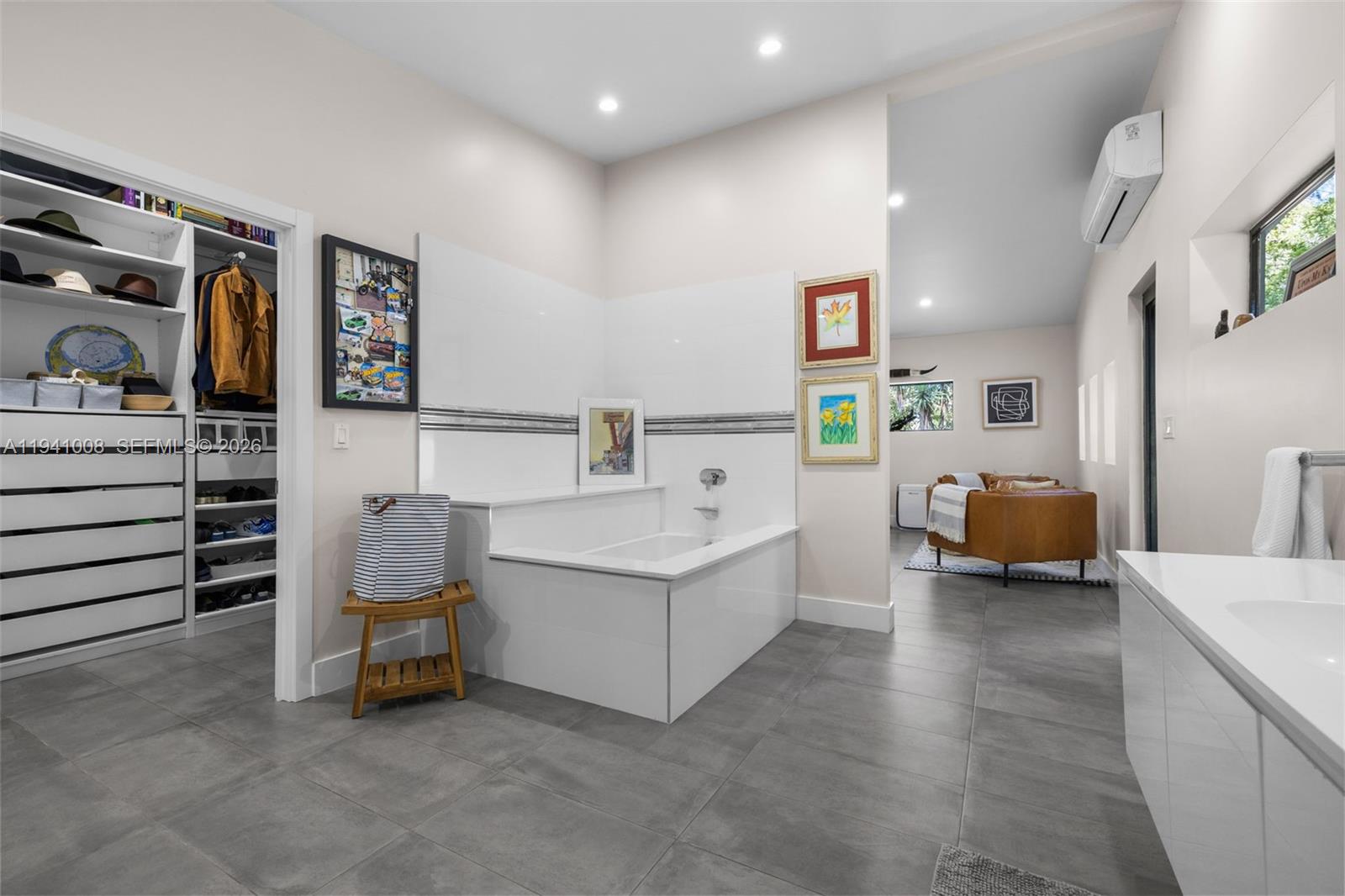 12033 Acme Road Wellington, FL 33414 - Photo 24 of 30 a view of living room with furniture and workspace