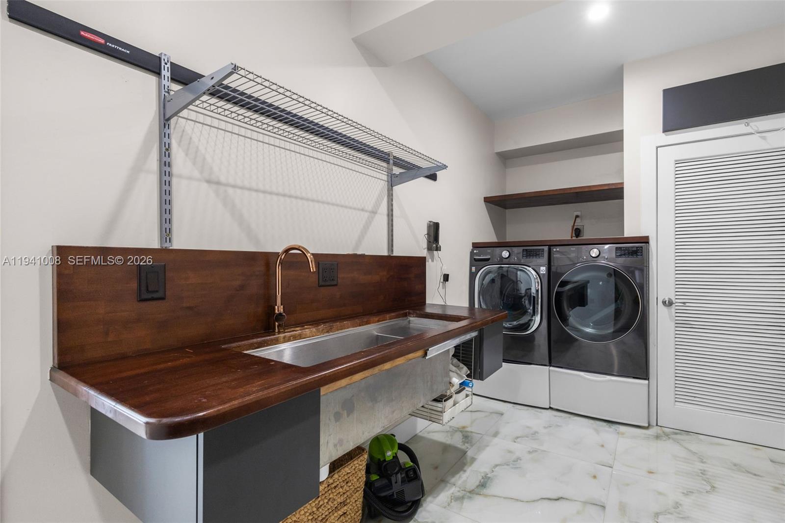 12033 Acme Road Wellington, FL 33414 - Photo 25 of 30 a utility room with dryer and washer