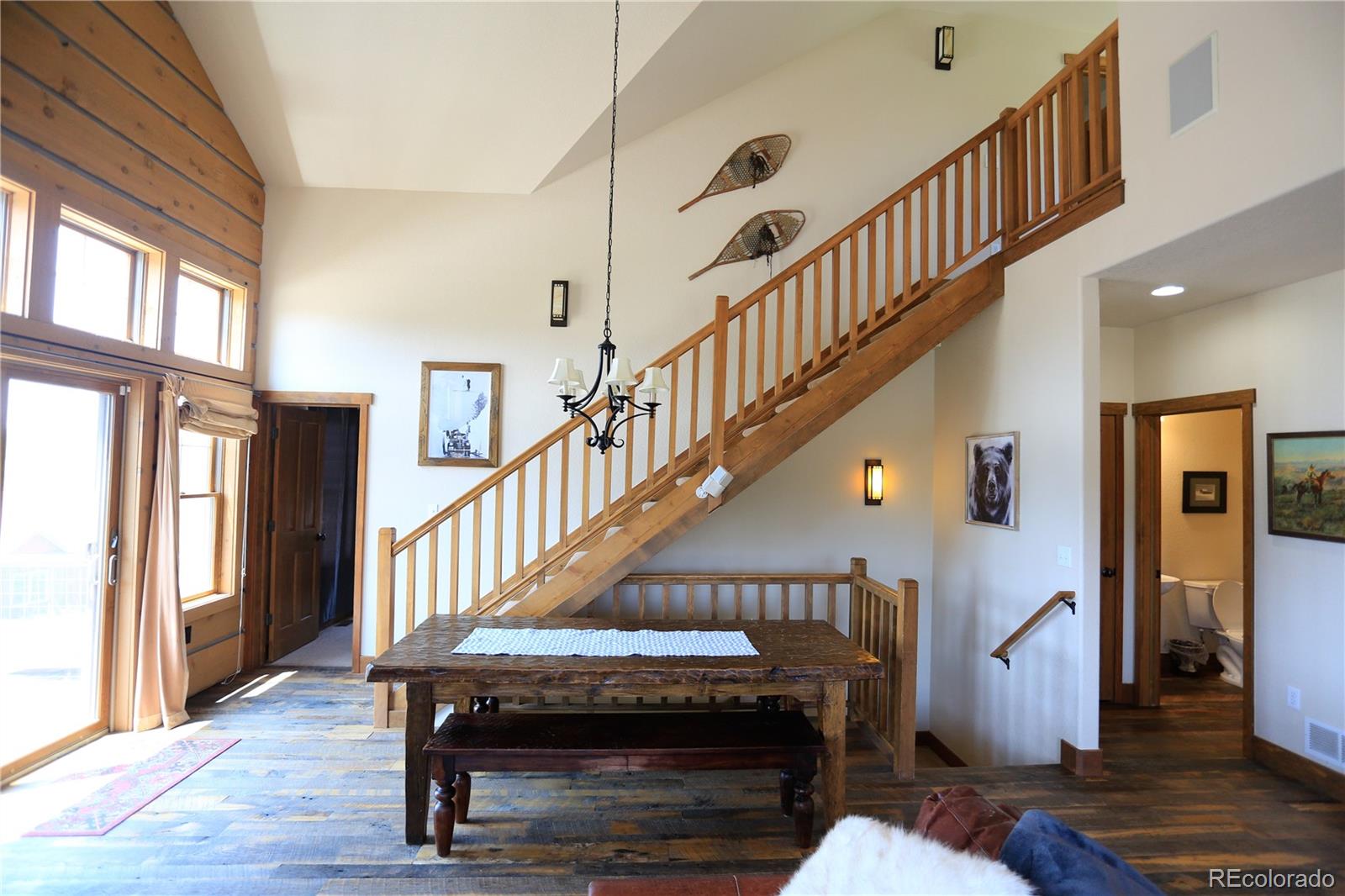 1324 Rendezvous Road Fraser, CO 80442 - Photo 15 of 36 a view of entryway livingroom and hall with wooden floor