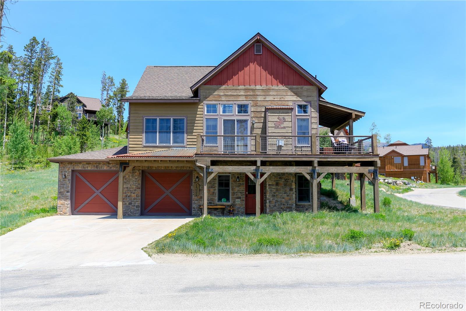 1324 Rendezvous Road Fraser, CO 80442 - Photo 2 of 36 a front view of a house with a garden