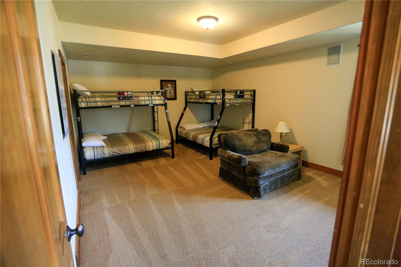 1324 Rendezvous Road Fraser, CO 80442 - Photo 25 of 36 a bedroom with a bed and window