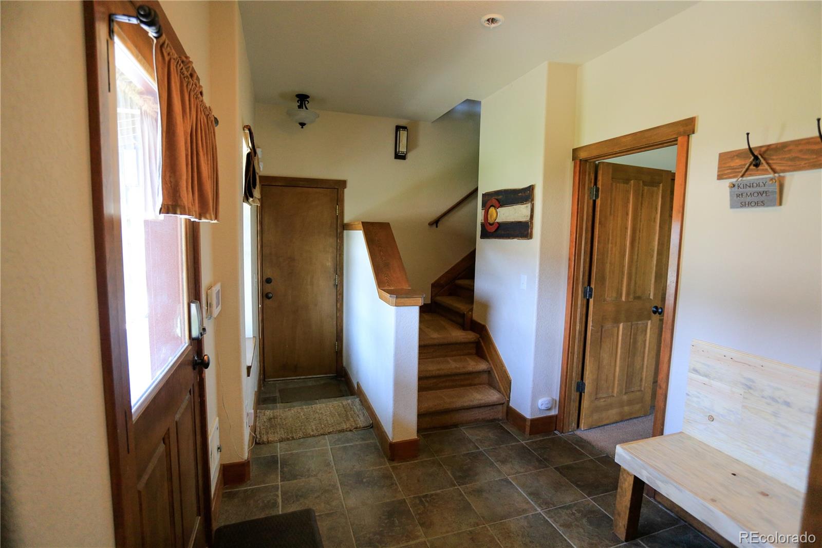 1324 Rendezvous Road Fraser, CO 80442 - Photo 27 of 36 a view of an entryway with staircase