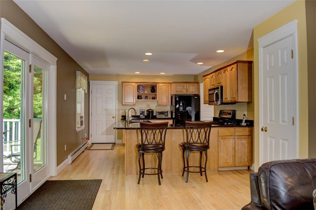 8 Sofia Road Saco, ME 04072 - Photo 8 of 22 Belly up to the kitchen bar and...