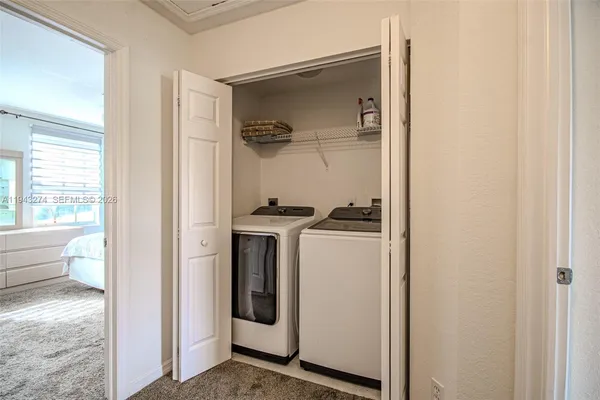 a storage room with washer and dryer