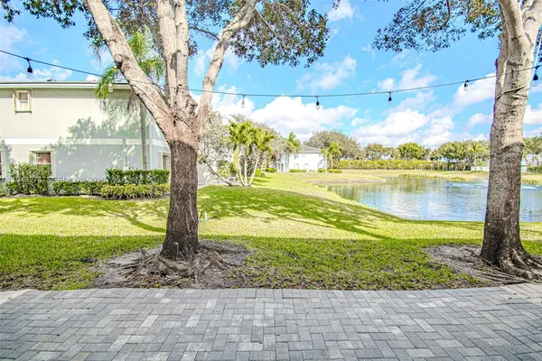 a view of a lake with a big yard