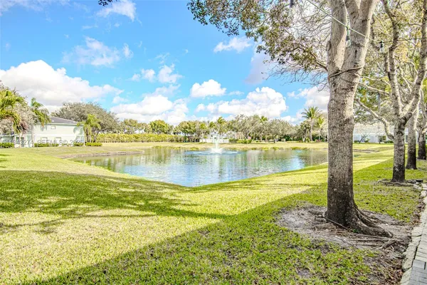 a view of a lake with a big yard