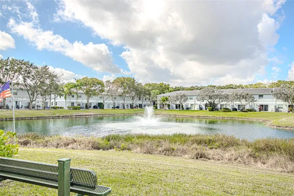 a view of a lake with a city