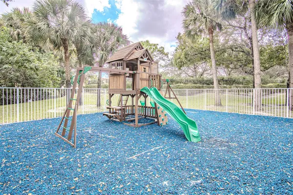 a view of a park with slide