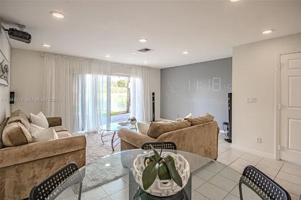 a living room with furniture and a couch
