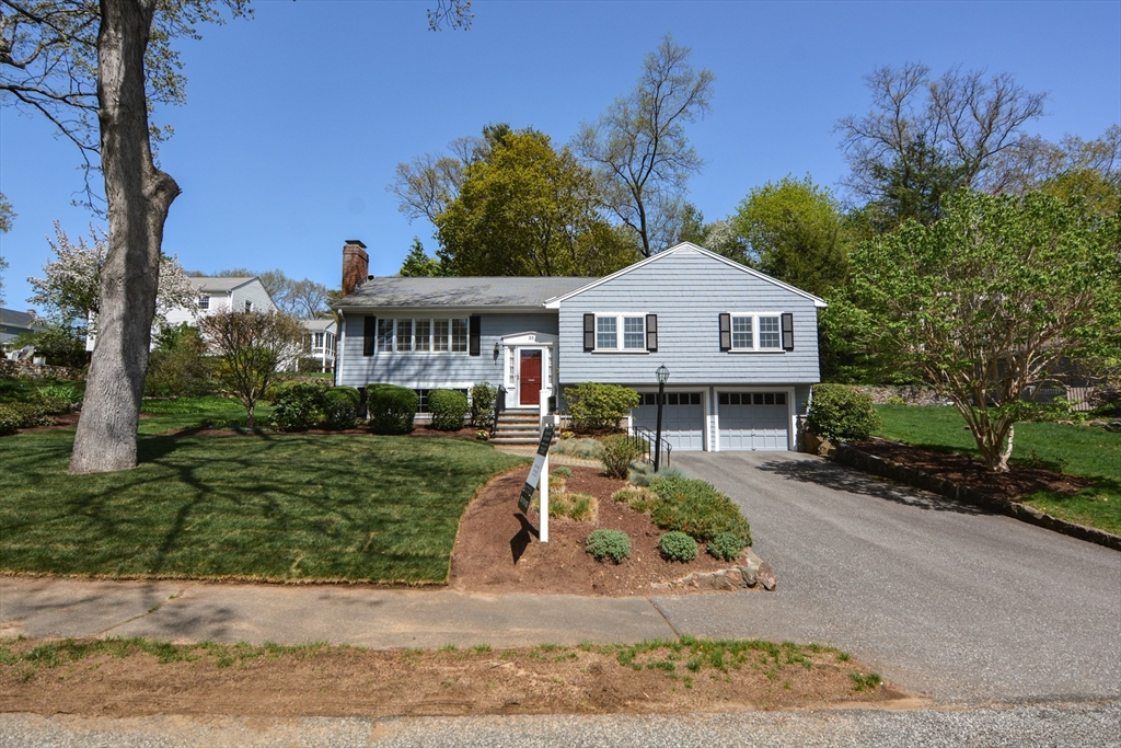 35 Windemere Road Wellesley, MA 02481 - Photo 1 of 24 a front view of a house with a yard