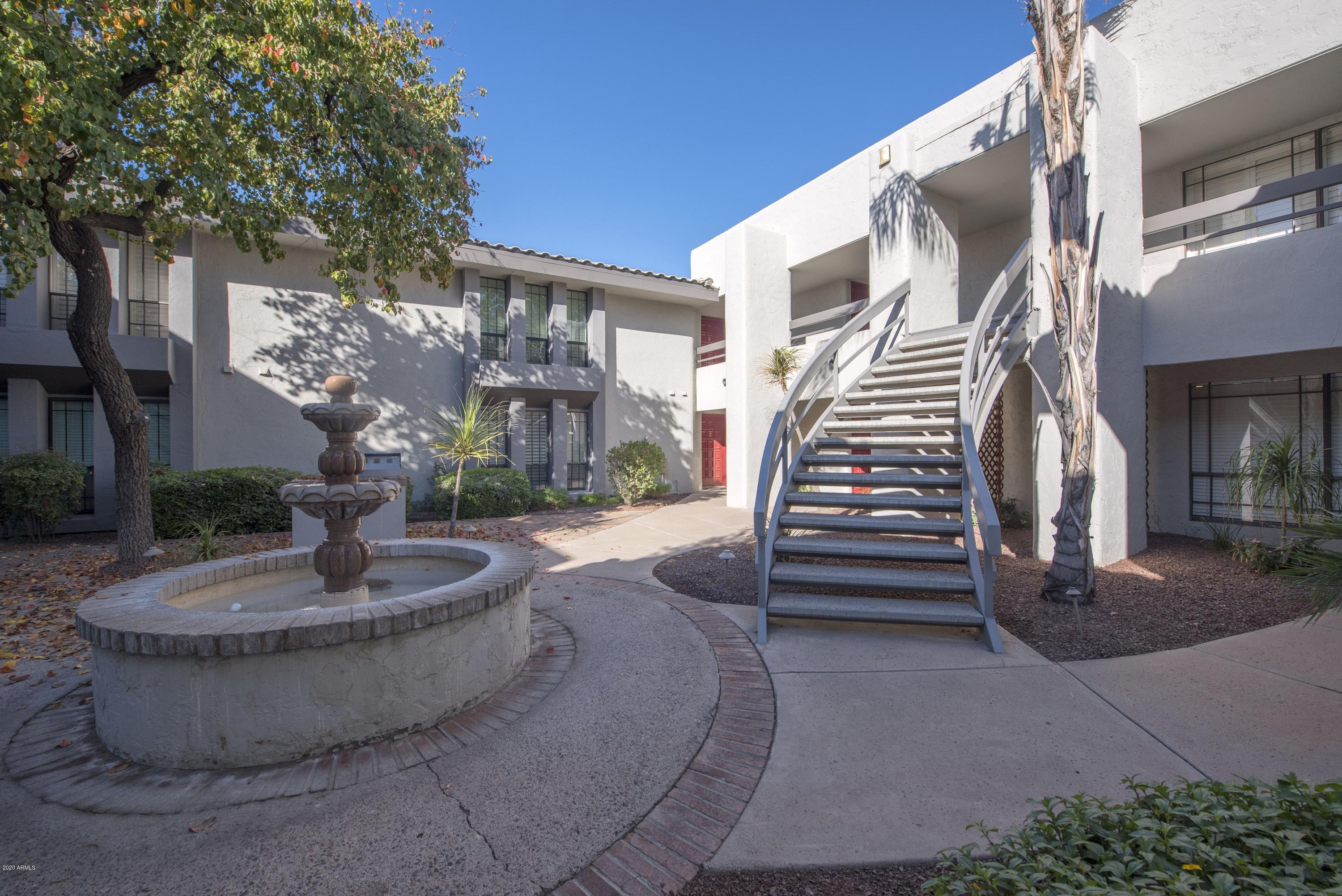 5209 North 24th Street, Unit 103 Phoenix, AZ 85016 - Photo 14 of 17 a view of the patio with a fountain