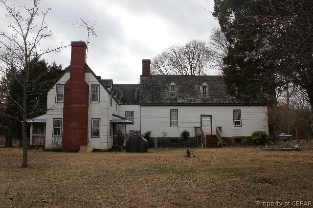 391 Haven Beach Road Moon, VA 23119 - Photo 1 of 43 a view of a house with a yard