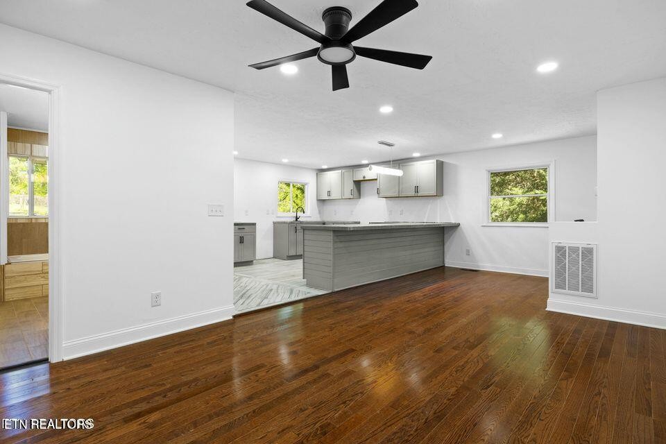 516 Delaware Avenue Oak Ridge, TN 37830 - Photo 17 of 43 a view of kitchen with granite countertop cabinets and wooden floor