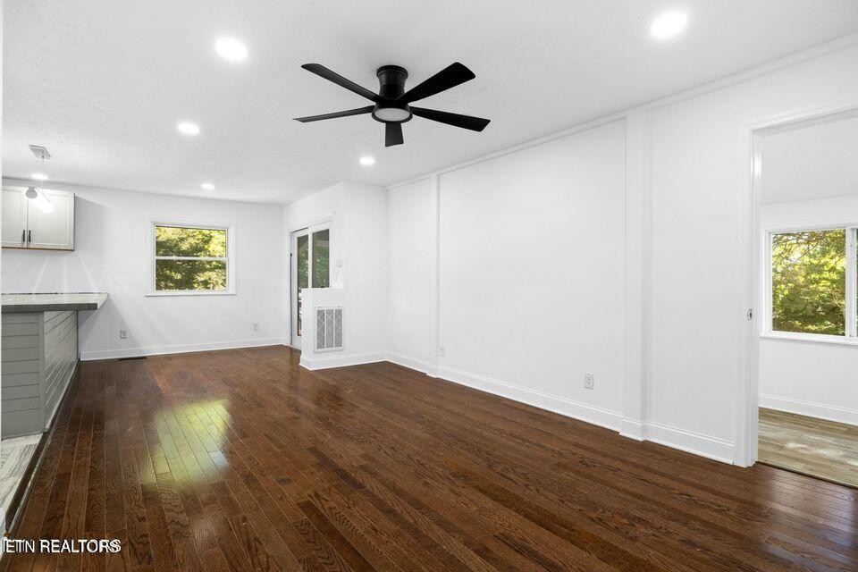 516 Delaware Avenue Oak Ridge, TN 37830 - Photo 18 of 43 a view of empty room with wooden floor and fan