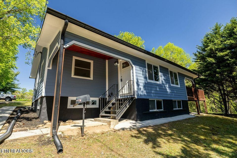 516 Delaware Avenue Oak Ridge, TN 37830 - Photo 2 of 43 a view of house with yard