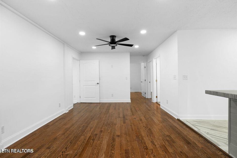 516 Delaware Avenue Oak Ridge, TN 37830 - Photo 26 of 43 wooden floor in an empty room with a window