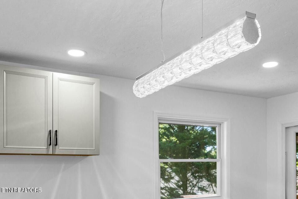516 Delaware Avenue Oak Ridge, TN 37830 - Photo 27 of 43 a view of a big room with windows