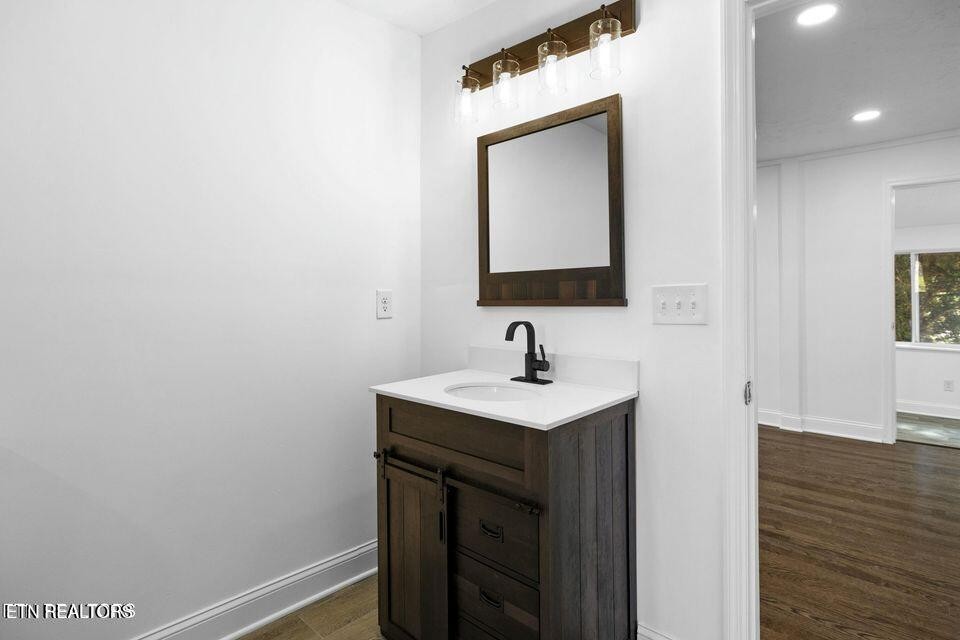 516 Delaware Avenue Oak Ridge, TN 37830 - Photo 30 of 43 a bathroom with a sink and a mirror