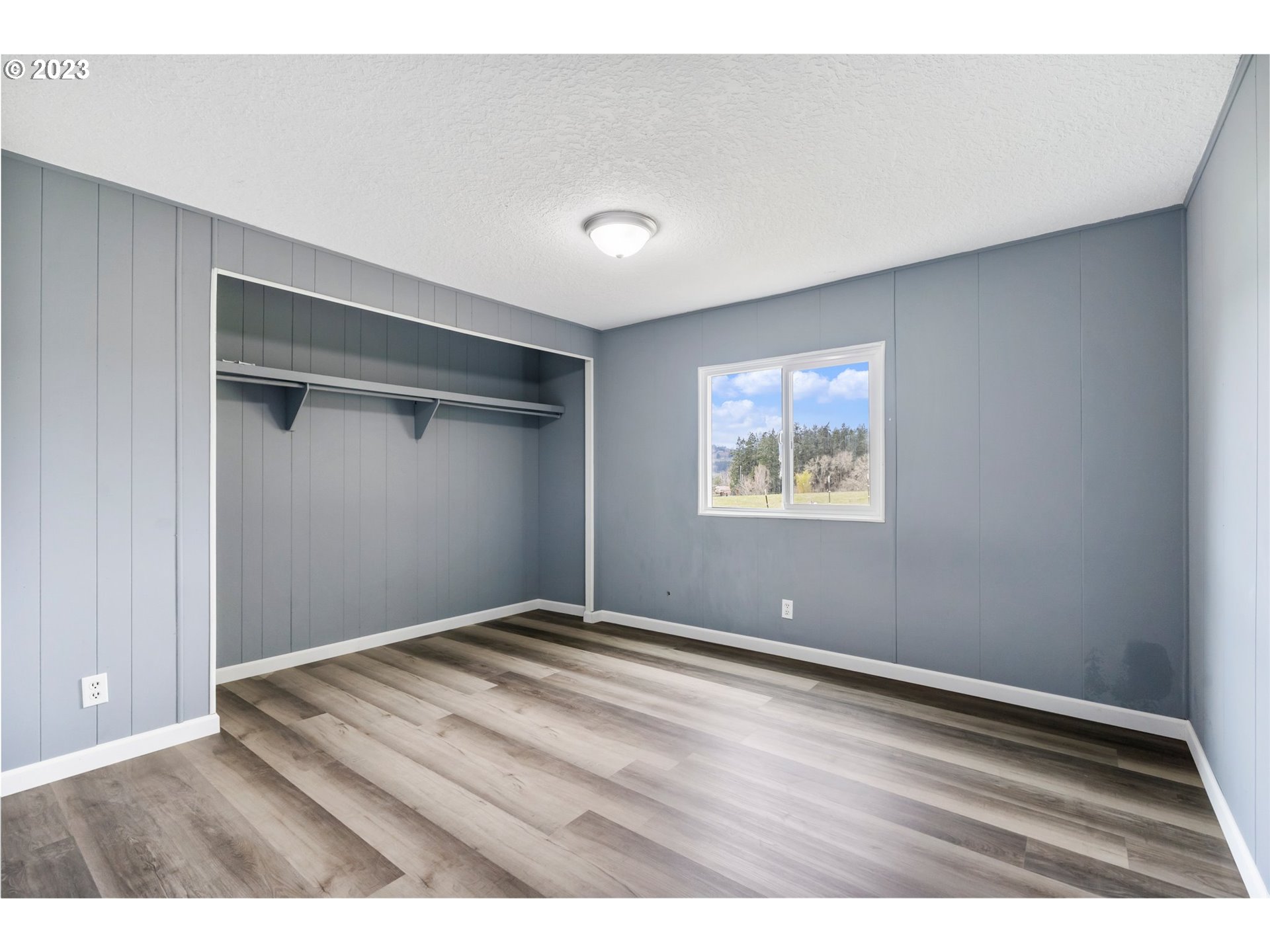 9183 Southwest Line Drive Cornelius, OR 97113 - Photo 22 of 38 a view of an empty room with a window