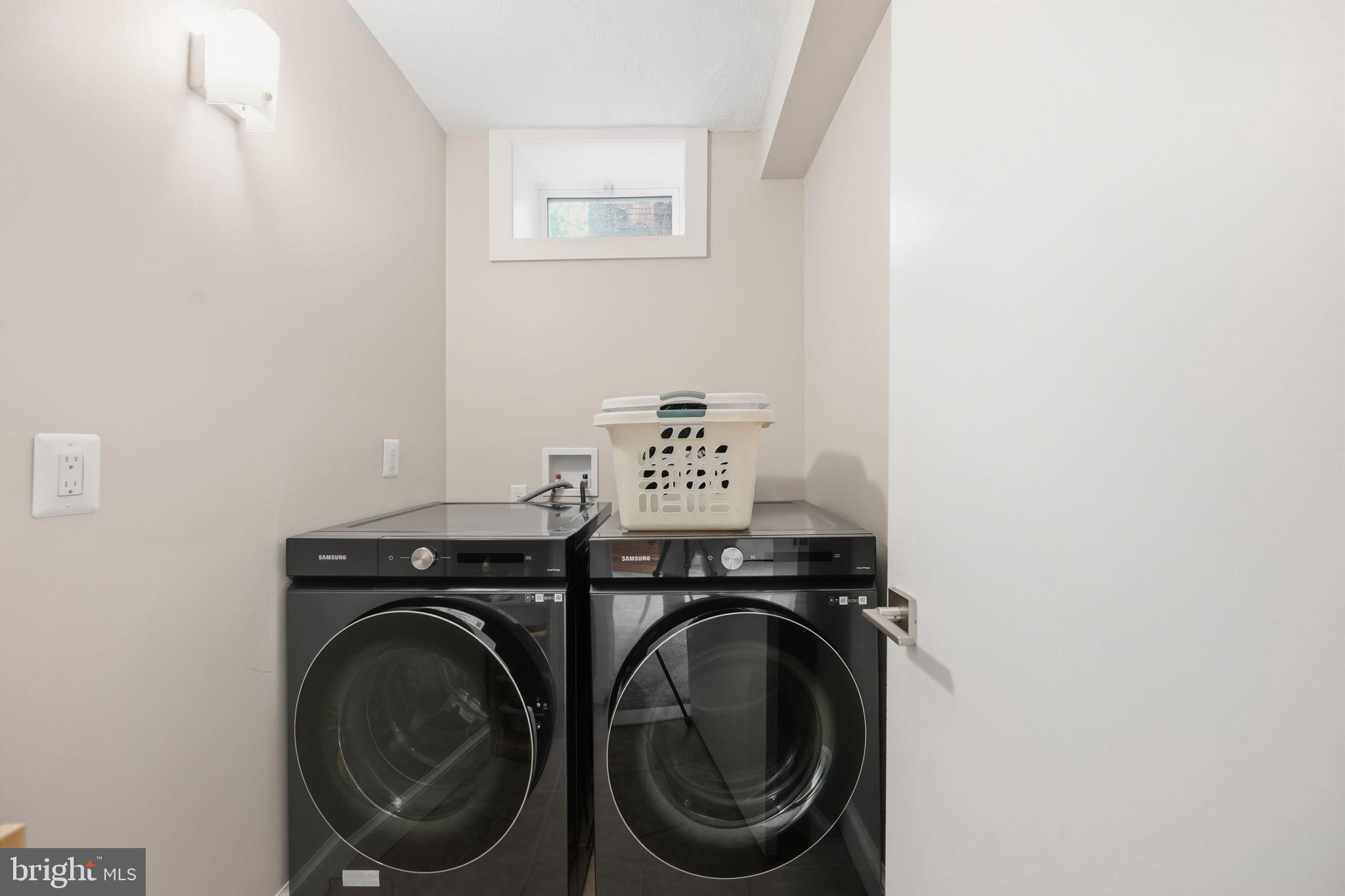 2829 29th Place Northwest Washington, DC 20008 - Photo 32 of 41 a view of a utility room with dryer and washer