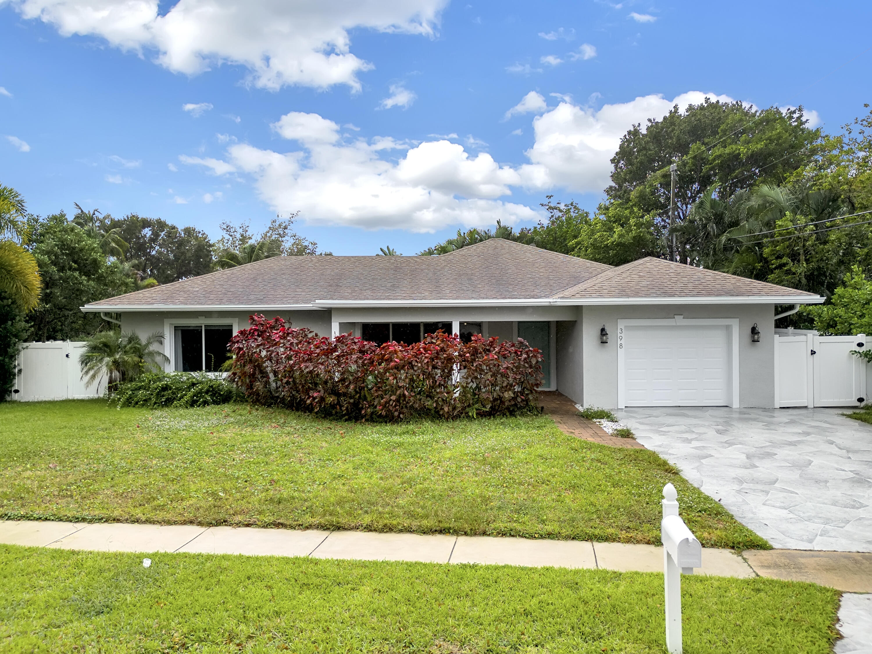 398 Northeast 23rd Street Boca Raton, FL 33431 - Photo 1 of 31 Front of the house