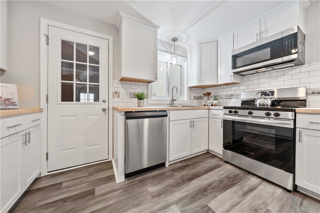 11 Ventura Road Gates, NY 14624 - Photo 13 of 43 new shaker cabinets, Butcher Block Counters, Subwa