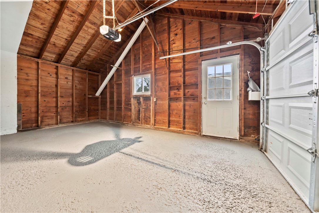 11 Ventura Road Gates, NY 14624 - Photo 39 of 43 Garage with new garage door opener and Man door to