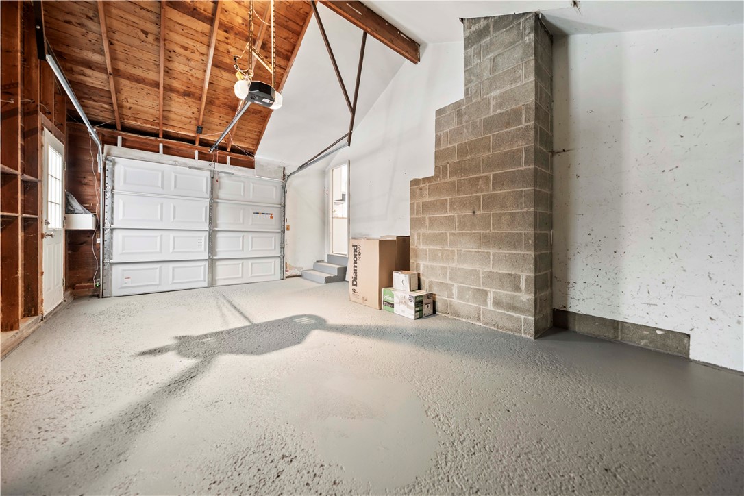 11 Ventura Road Gates, NY 14624 - Photo 40 of 43 Garage with new garage door opener and Man door to