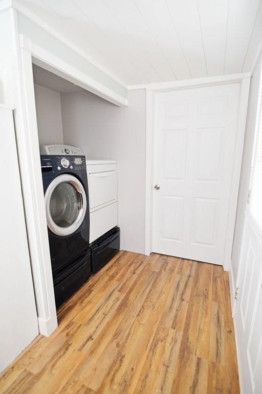 111 Groton Street Springfield, MA 01129 - Photo 11 of 26 a bedroom with a bed and a sink
