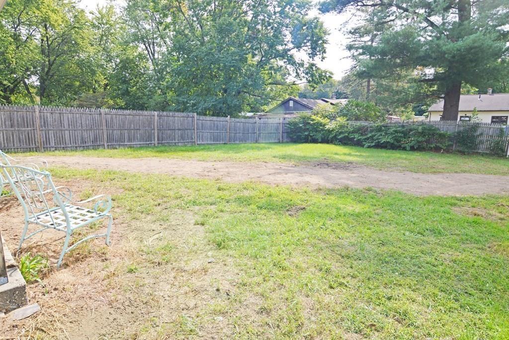111 Groton Street Springfield, MA 01129 - Photo 22 of 26 a view of swimming pool with trees in the background
