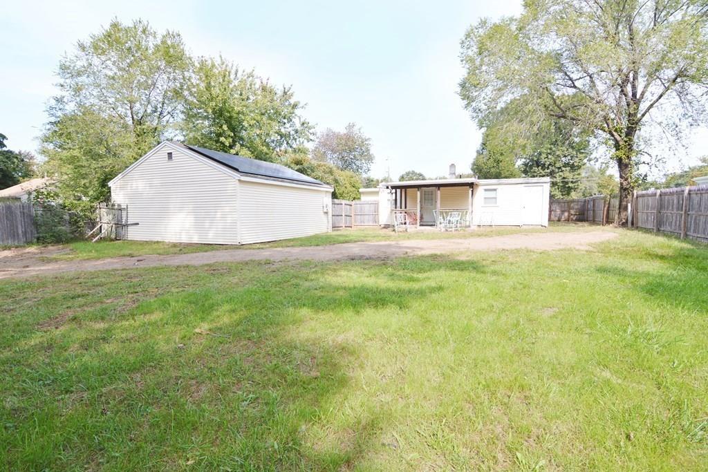 111 Groton Street Springfield, MA 01129 - Photo 24 of 26 a view of a yard with large tree