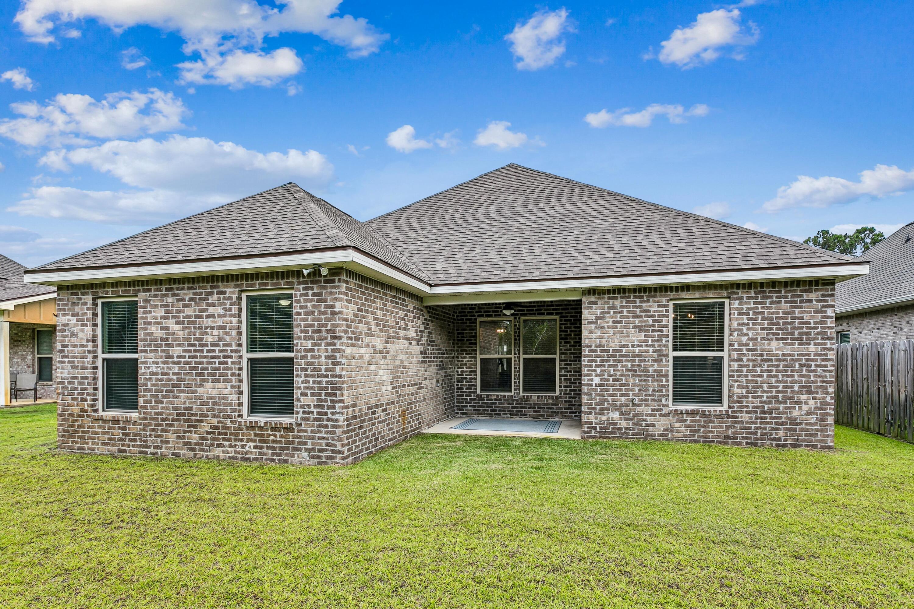 124 Apollo Avenue Freeport, FL 32439 - Photo 26 of 41 Quality Brick Masonry!