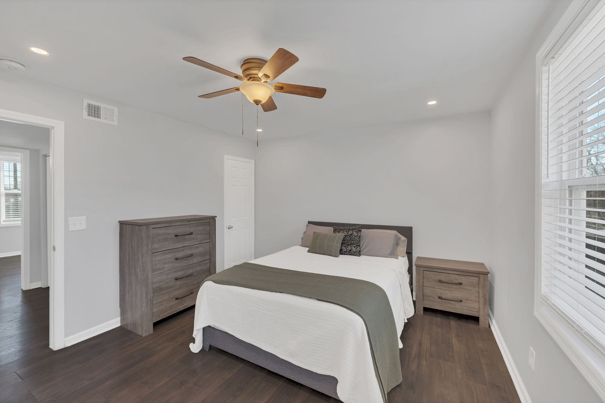 1016 Cheyenne Boulevard Madison, TN 37115 - Photo 12 of 25 a bedroom with a bed and a chandelier