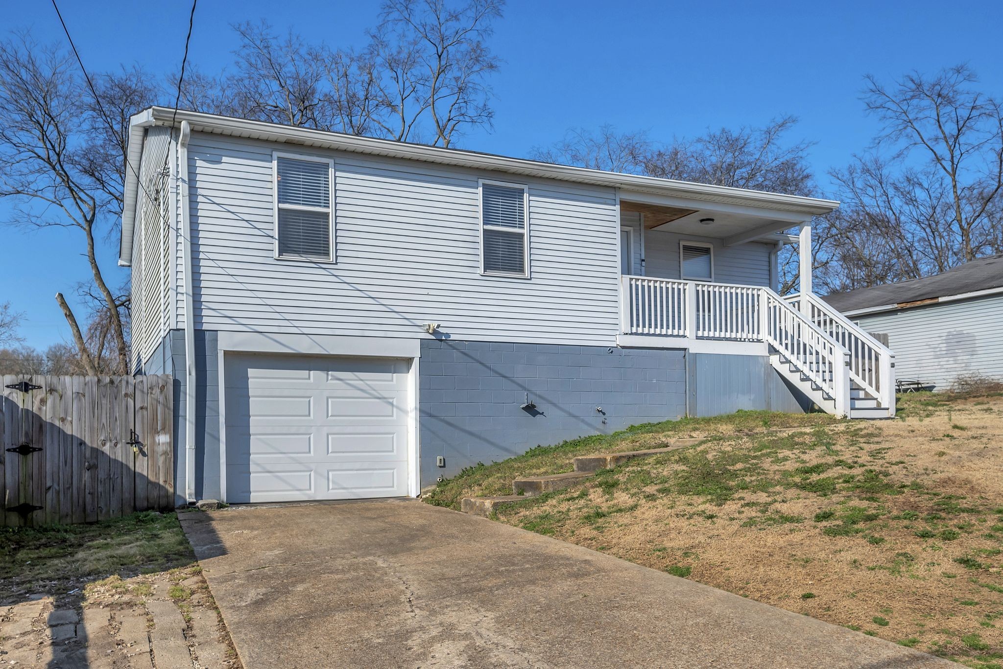 1016 Cheyenne Boulevard Madison, TN 37115 - Photo 3 of 25 a view of a house with a snow in the yard