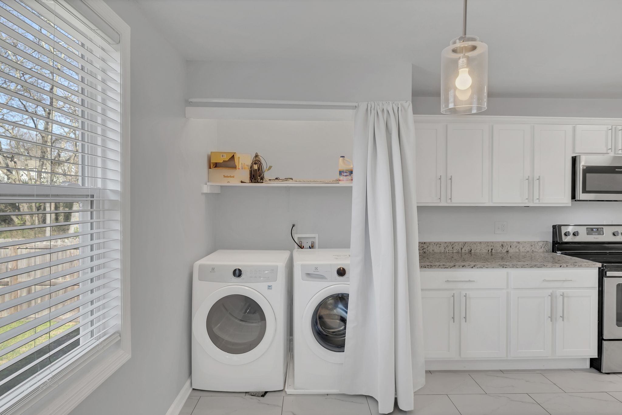 1016 Cheyenne Boulevard Madison, TN 37115 - Photo 10 of 25 a utility room with sink dryer and washer