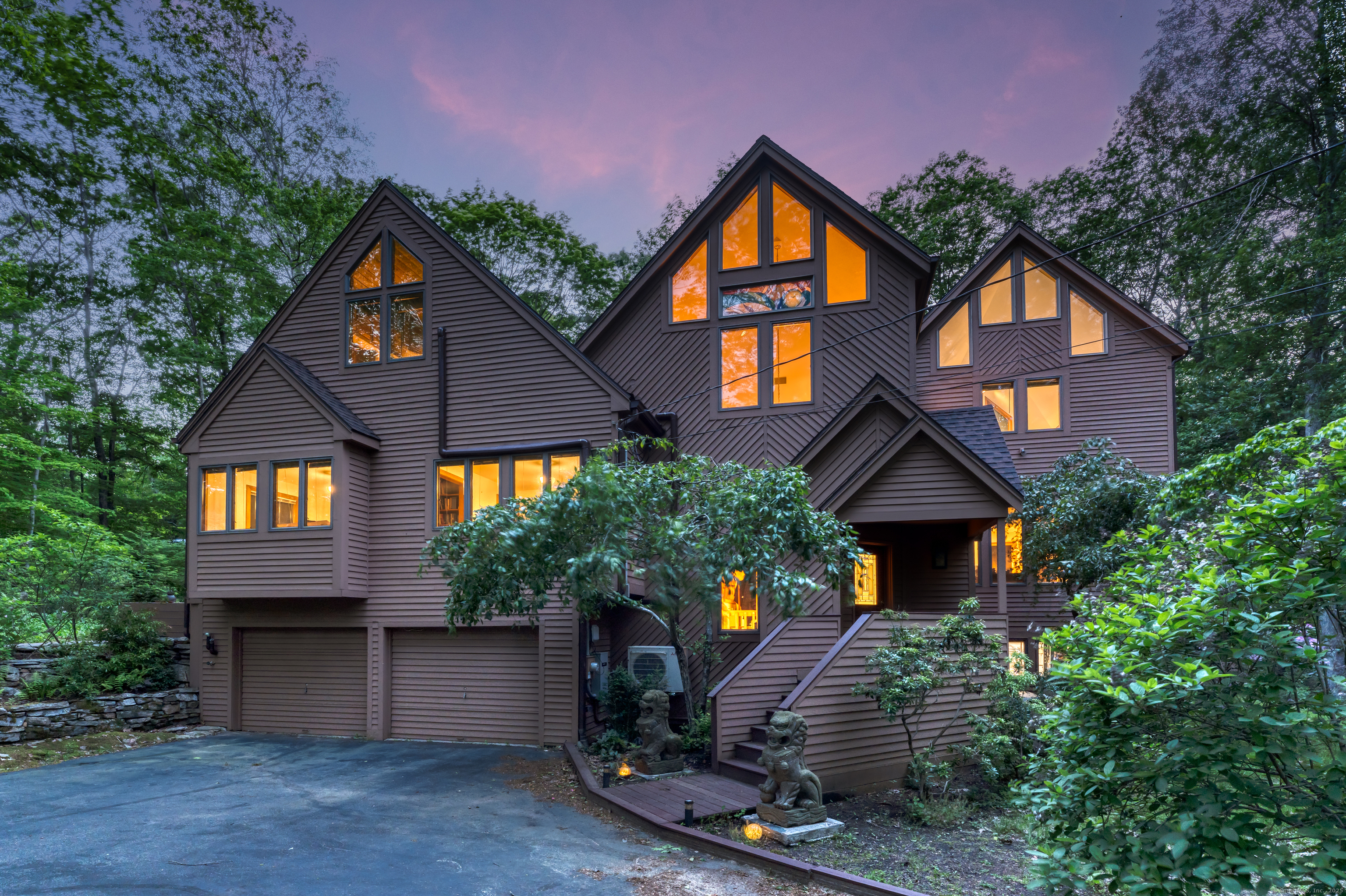 522 Peddlers Road Guilford, CT 06437 - Photo 1 of 1 a front view of a house with a yard