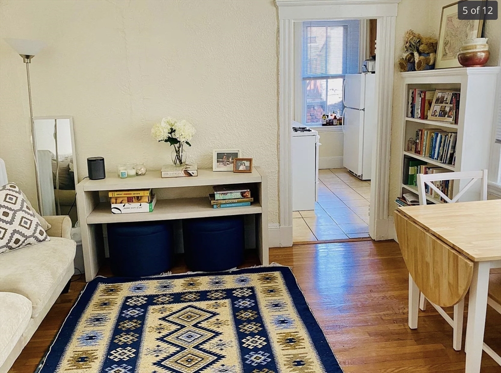 23 Temple Street, Unit 6 Boston, MA 02114 - Photo 9 of 10 a view of bedroom with furniture and book shelf