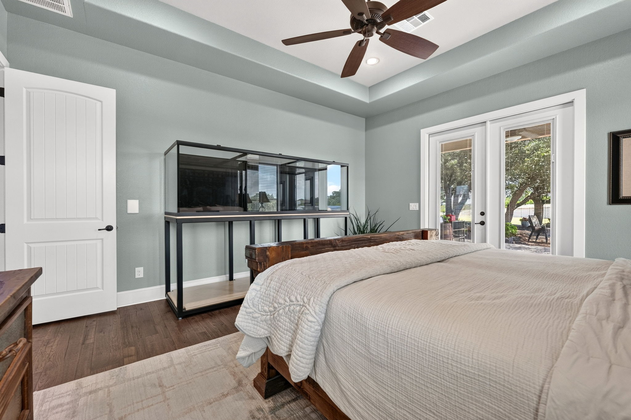 105 Coopers Hill Road Georgetown, TX 78633 - Photo 20 of 40 a bedroom with a bed and a flat screen tv