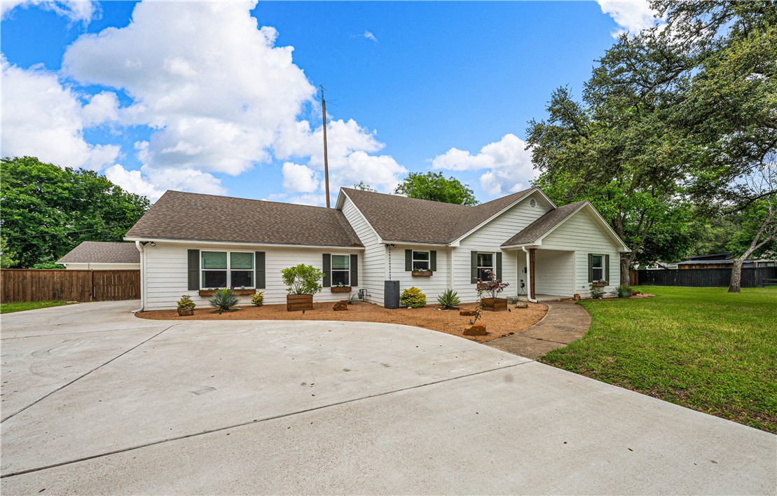 3405 MacArthur Drive Waco, TX 76708 - Photo 20 of 83 a view of a house with a yard and large tree