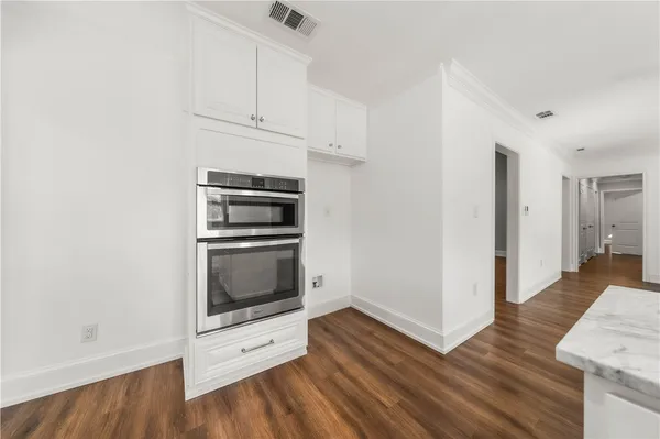 a view of a room that has a window in it