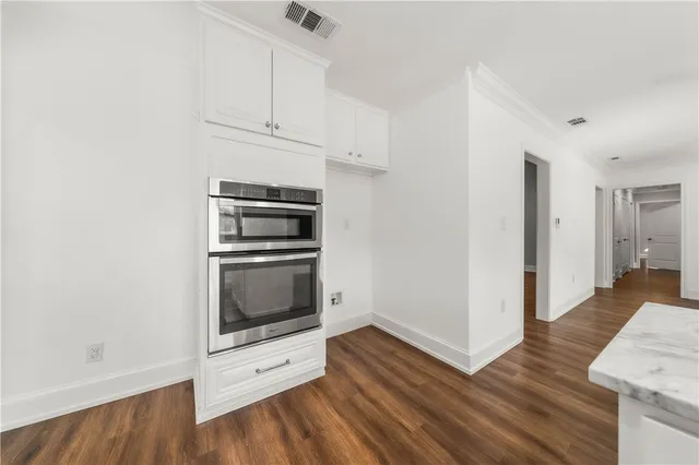 a view of a room that has a window in it