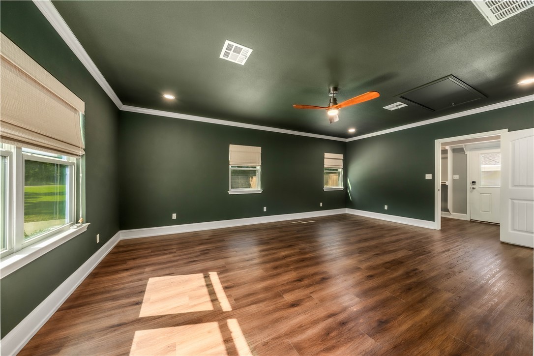 3405 MacArthur Drive Waco, TX 76708 - Photo 38 of 83 a view of an empty room with window and wooden floor